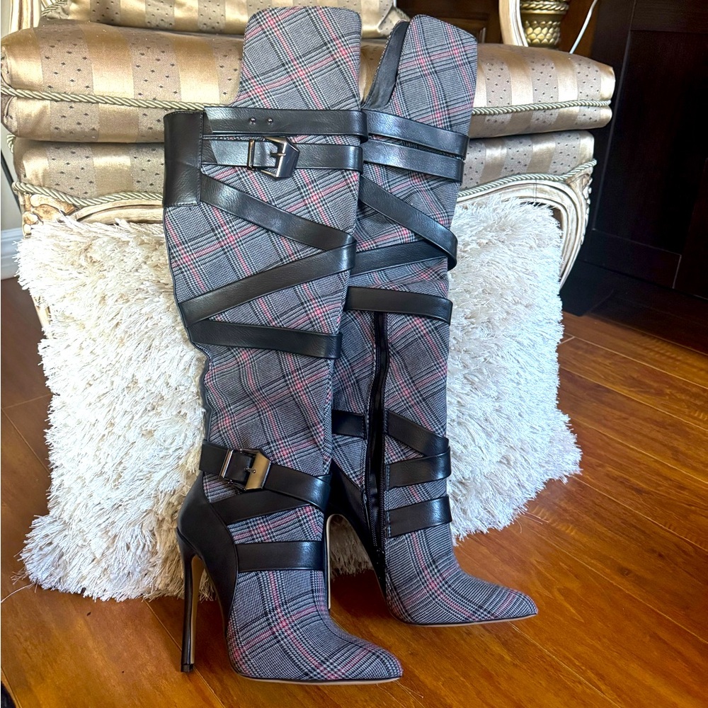 Never worn multicolour knee-high boots got them at winners .